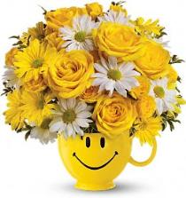 Teleflora's Be Happy Smile Mug Bouquet Photo of Teleflora's Be Happy Smile Mug Bouquet